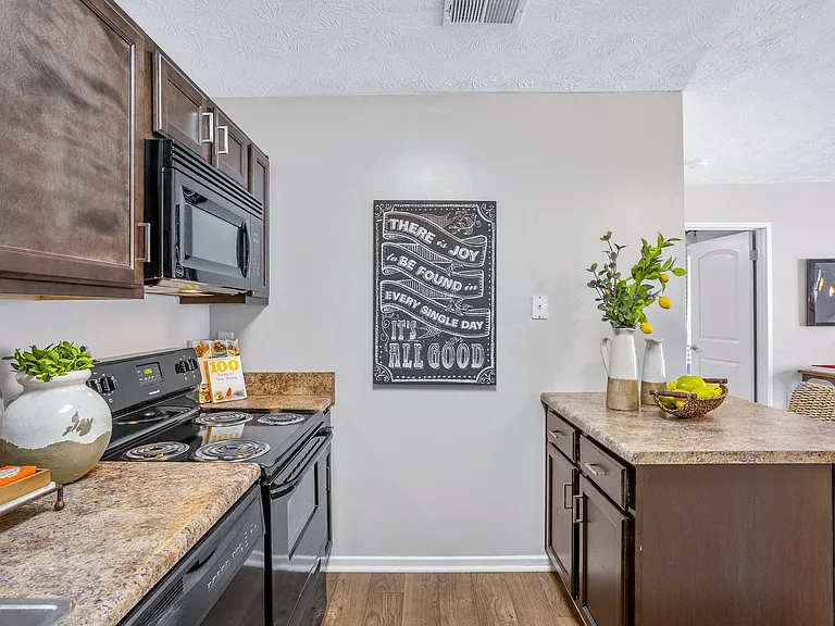 Gourmet kitchens complete with breakfast bars.
