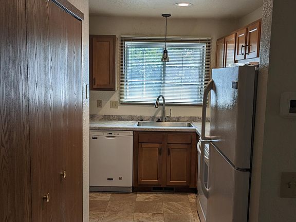 Previously rehab'd kitchen. It will look very similar to this layout but be just a slightly different color.