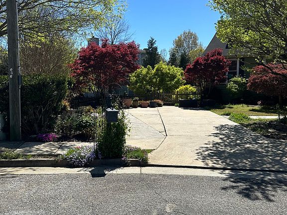 Entrance to apartment is at top of driveway, down the stairs in back.