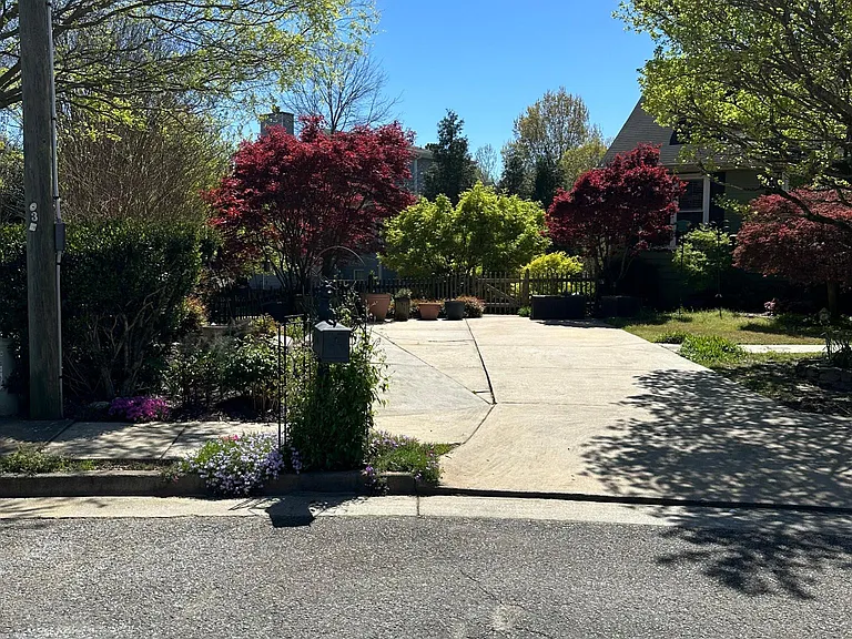 Entrance to apartment is at top of driveway, down the stairs in back.