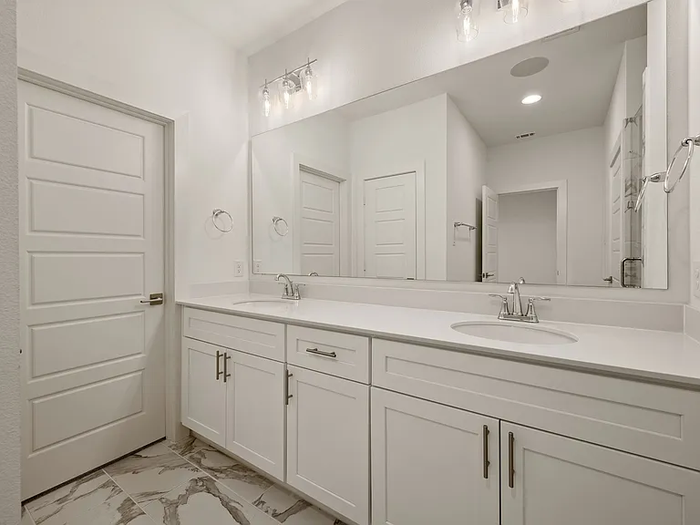 Master bedroom en suite master full bathroom with walk-in closet