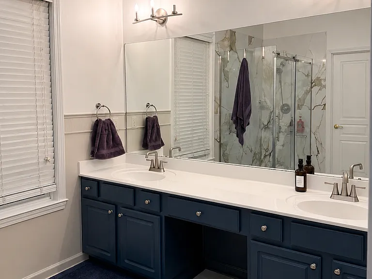 Master bath vanity with double sinks.