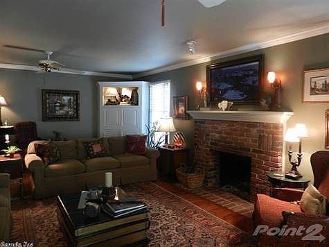 Built-ins, ceiling fans, FP, hardwoods & wet bar