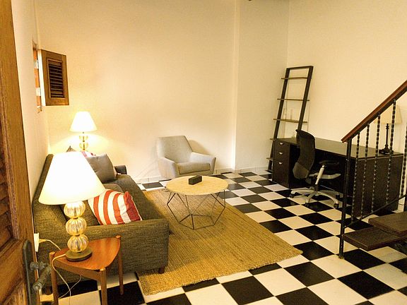 The spacious office area and second living room. The couch contains a sofa bed for visiting friends and family.