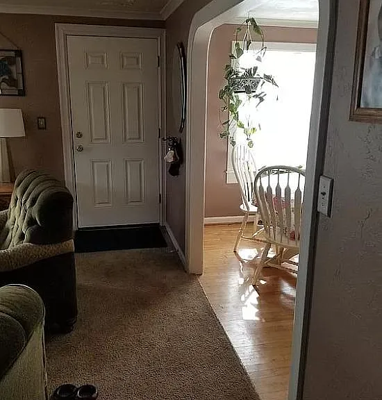 Arched entry to dining room keeps historic charm!