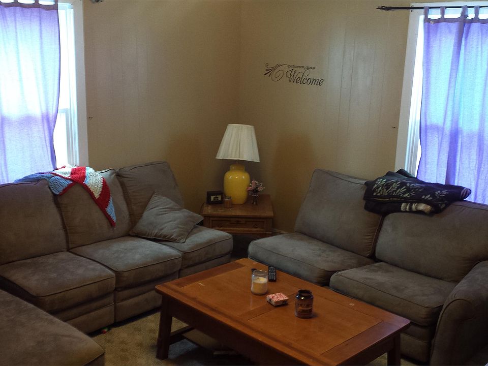 The spacious living room has great natural lighting through the new 2014 energy saving windows.
