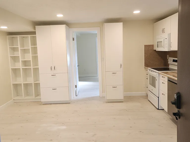 Lots of cabinet space, cabinets include pull-out drawers.