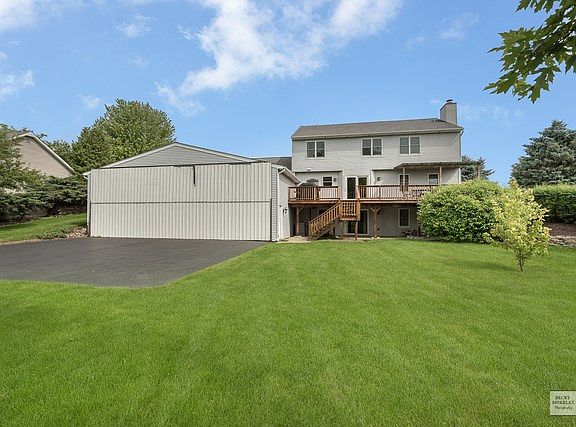Aluminum siding on the back and sides.