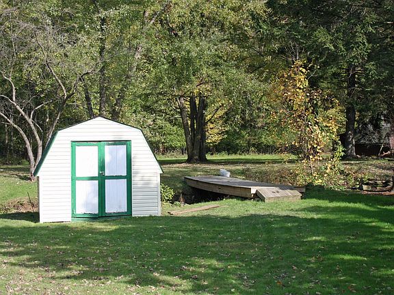 Shed and bridge over creek