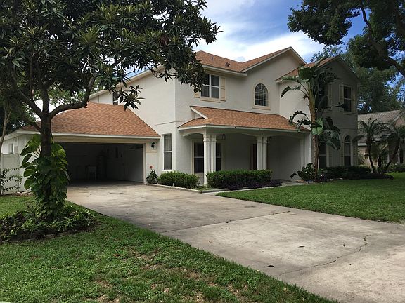 Front house with 2 car garage. And long drive way easy to park 4 cars.