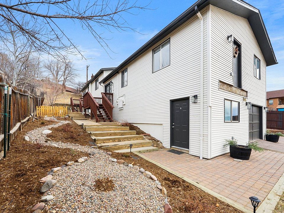 Picture taken before new deck was installed! Property is on a hill- New tenant must be okay with stairs.