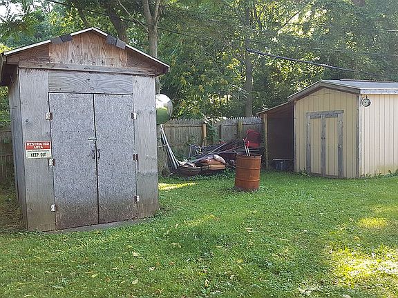 Two storage sheds 