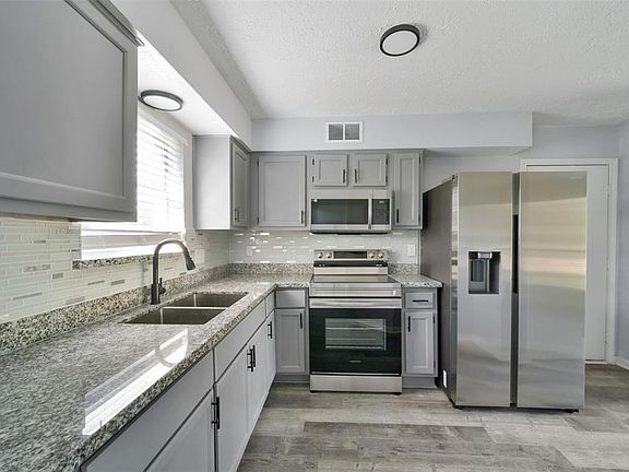 5th image of 7419 Wovenwood Lane