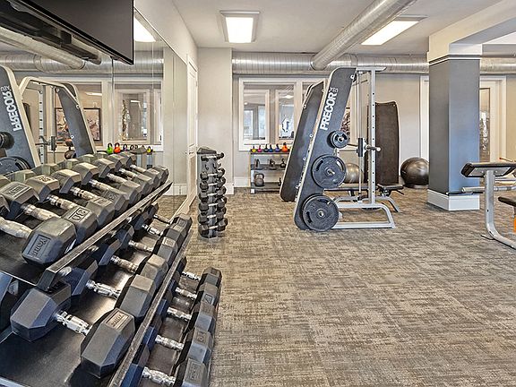 Health club with Precor equipment, Smith machine, cardio suite and free weights to 75 lbs