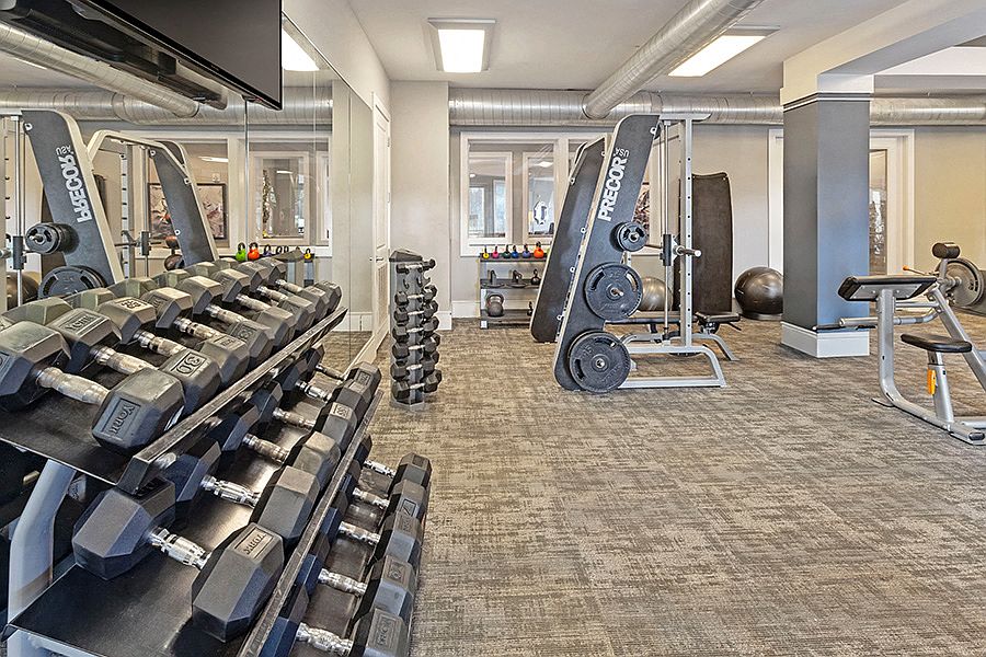 Health club with Precor equipment, Smith machine, cardio suite and free weights to 75 lbs