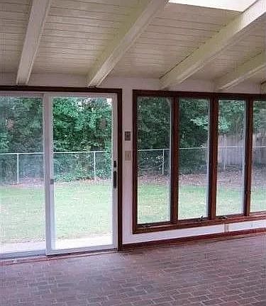 sun porch (three sliding doors, windows on 3 sides, two skylights)