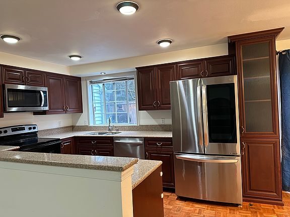 Kitchen View with modern Refrigerator