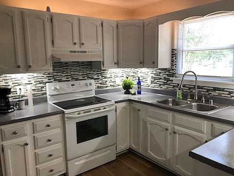 Newly updated kitchen with above and below cabinet lighting