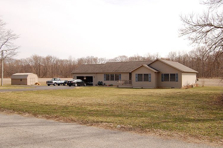 BEAUTIFUL RANCH HOME W/ LAND