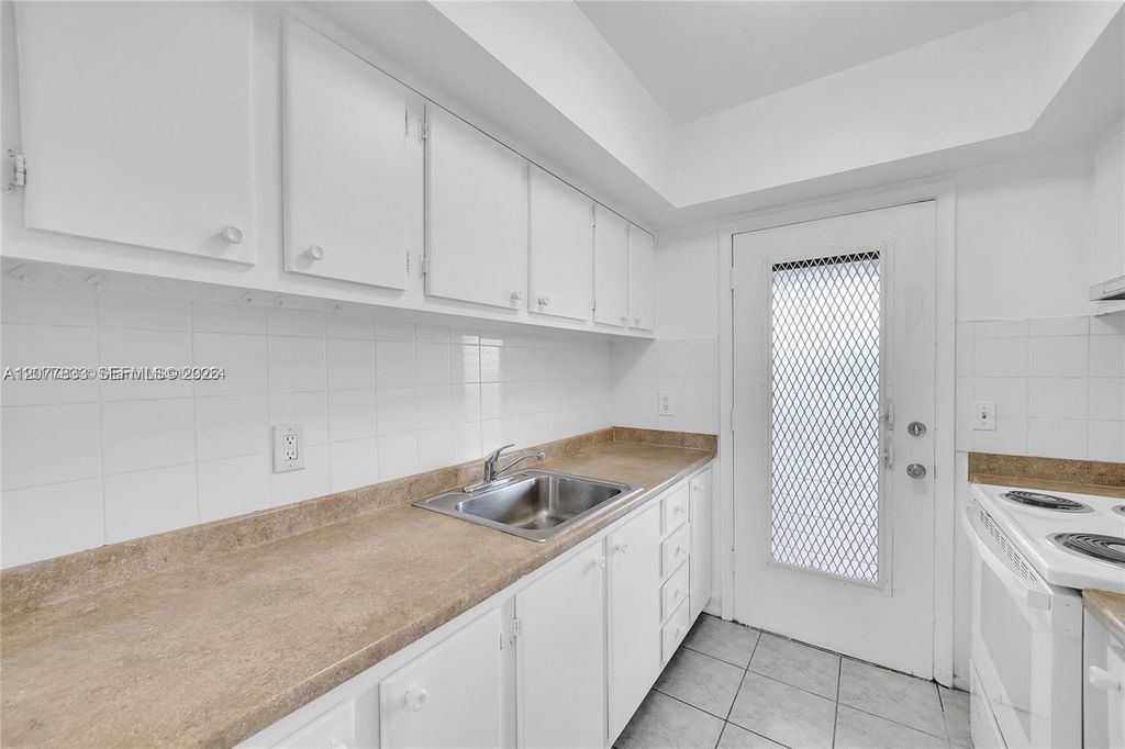 1050 E Sample Rd APT 309, photo 7
