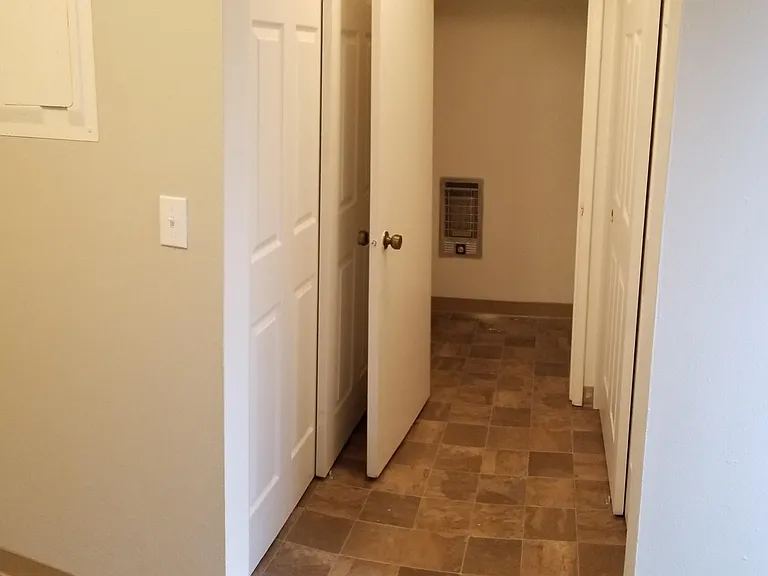 townhouse entry hall closets going to 1/2 bath