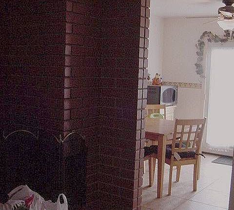 FireplaceLookingIntoBeakfastNookW/FrenchDoors