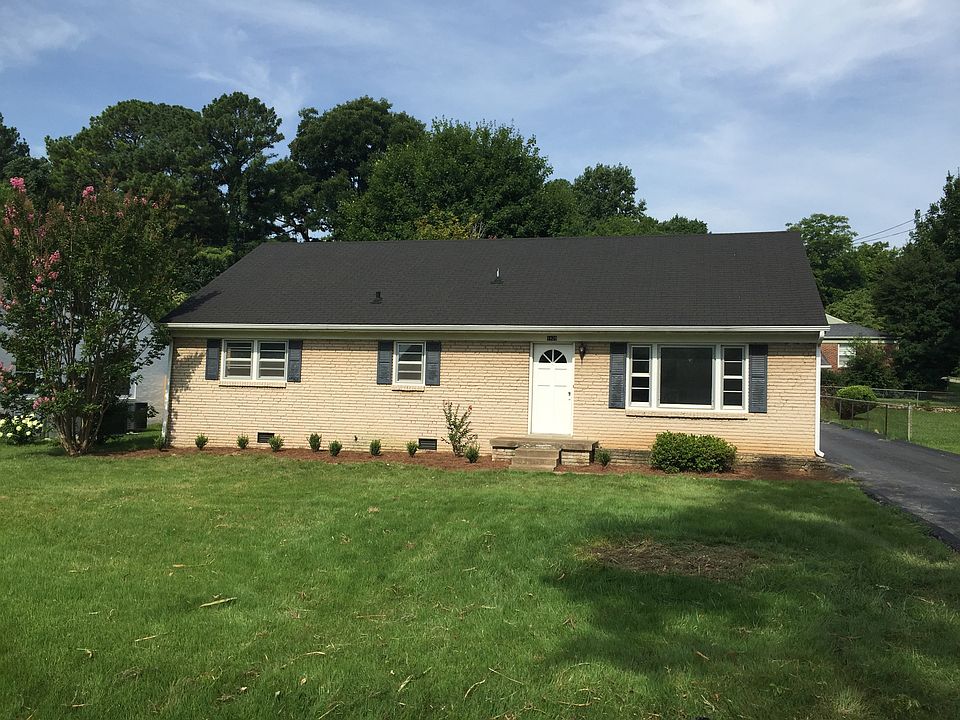 Nice yard, paved driveway, 2 car garage/carport plus a works