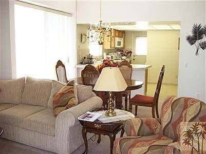 View from north patio door looking past living room to dinin