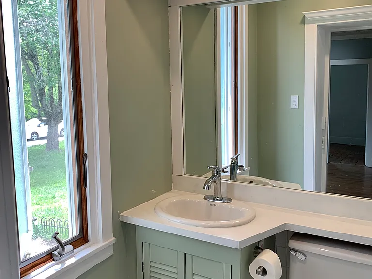 Bathroom, with window, heater, vented fan and shower/tub