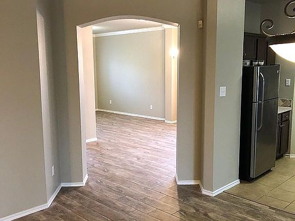 View from Kitchen Nook to formal living and formal dining