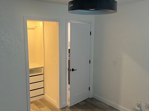 Bedroom with walk in closet