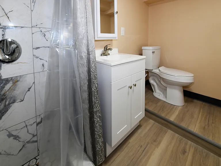 Unit B bathroom in lower level