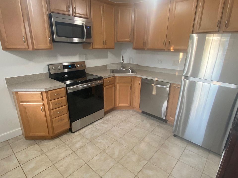 Kitchen with stainless steel appliances.