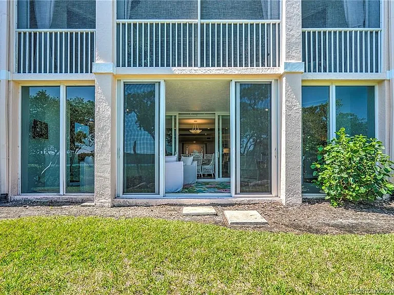 5799 NE Island Cove Way #1104 — Photo 54