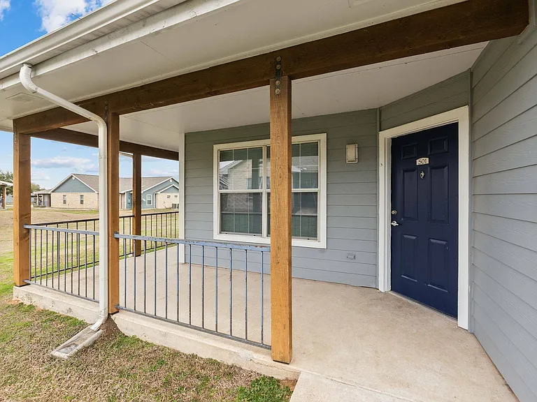 Inviting Front Porch with Classic Design at Crescent Village in Elgin, TX