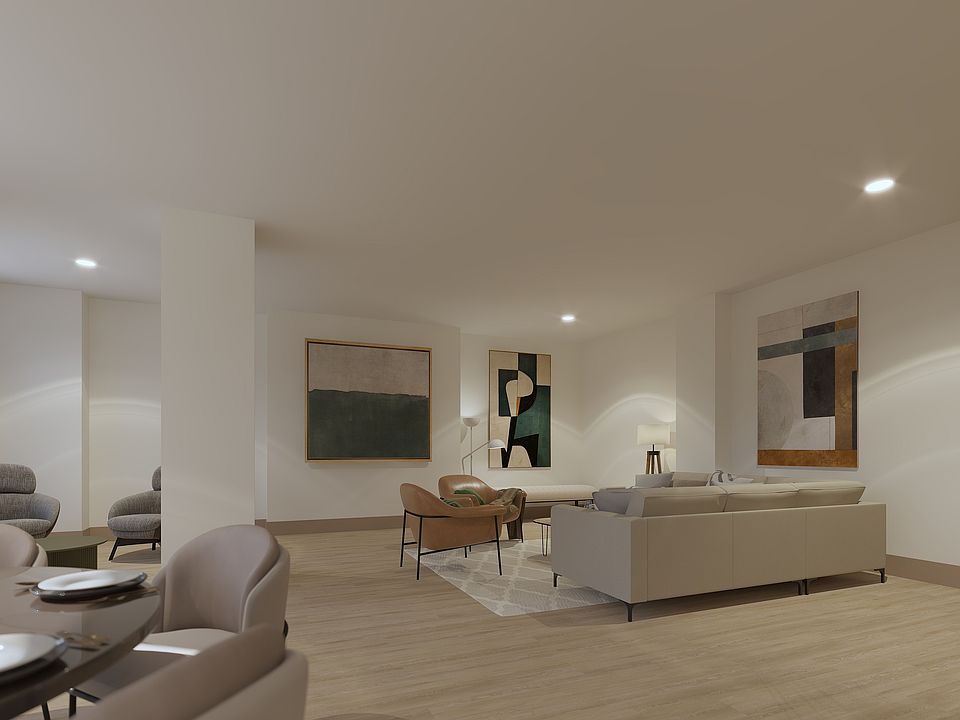 Penthouse Suite: 2 Bedroom 2.5 Baths Bi-level, Experience luxury and style in this beautifully designed open-concept living room.