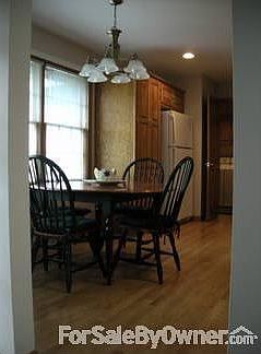 Kitchen
						:
						Oak wood floors in dining nook and kitchen, laundry beyond, freshly painted