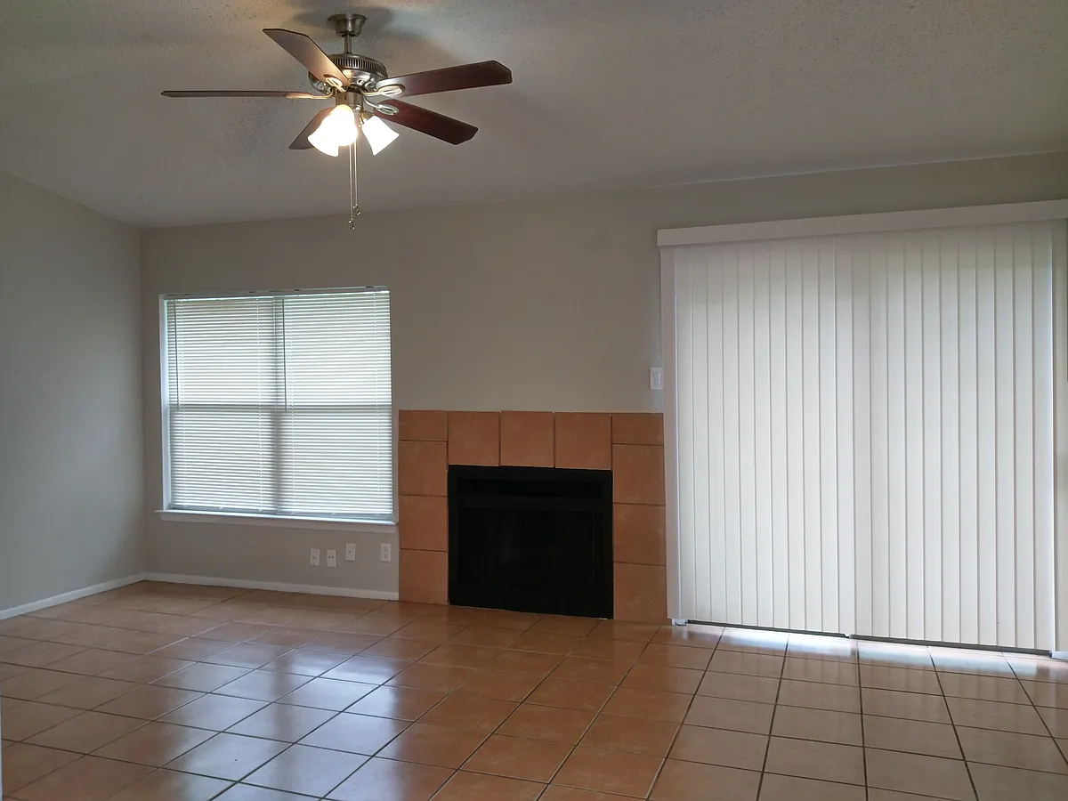 Living Room with Backyard Access - 2506 Corian Glen Dr