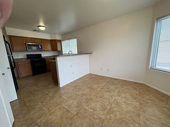 5th image of 7815 S Wild Primrose Ave