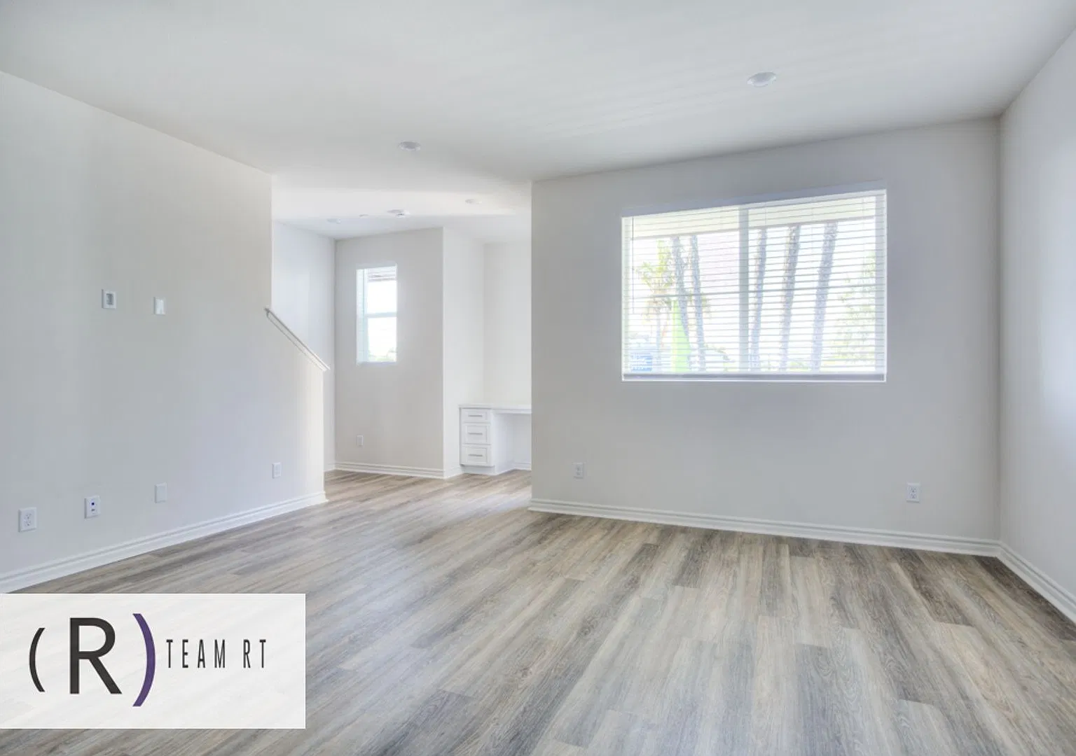 Modern 4-Bedroom Tri-Level Home with EV Charging & Solar in Artesia ! — Photo 1