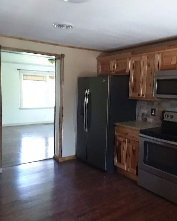 Kitchen with hickory cabinet
