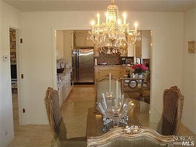 Dining room looking into stainless kitchen