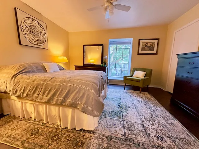 Bedroom with window looking at St. Charles