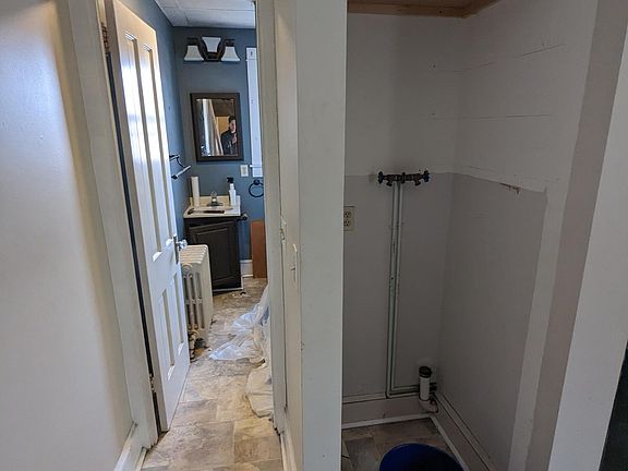 Laundry closet and bathroom entrance