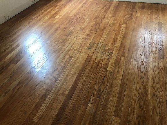 Hardwood floors in bedroom and living room have been refinished