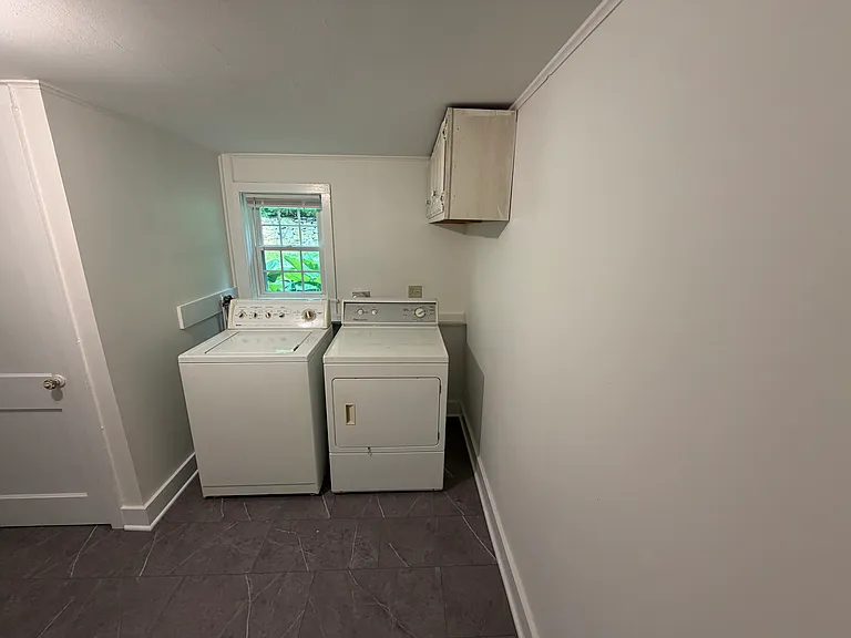 Laundry area from primary bedroom door
