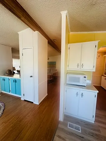 Open floor plan from the kitchen, kitchen nook looking into the living room.
