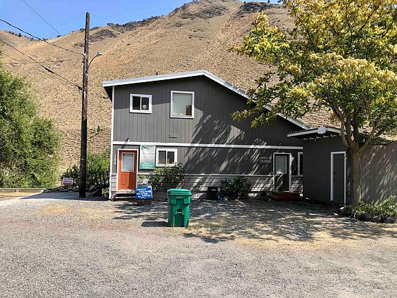 View of the front of the house. Virtually no maintenance outside required. No garage needed as weather in Riggins is mild. Storage shed included in rental.