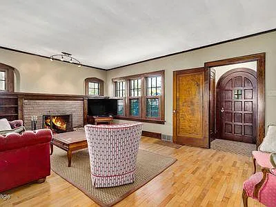 Spacious Living Room with wood burning fireplace