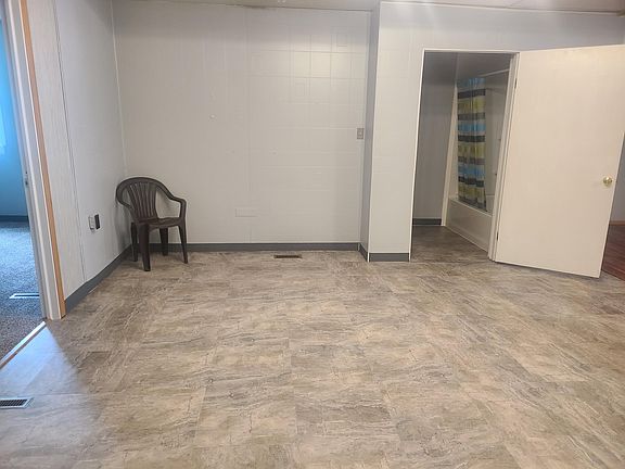 Living area 15 x 14: your choice, living room or dining area and office in vinyl tile